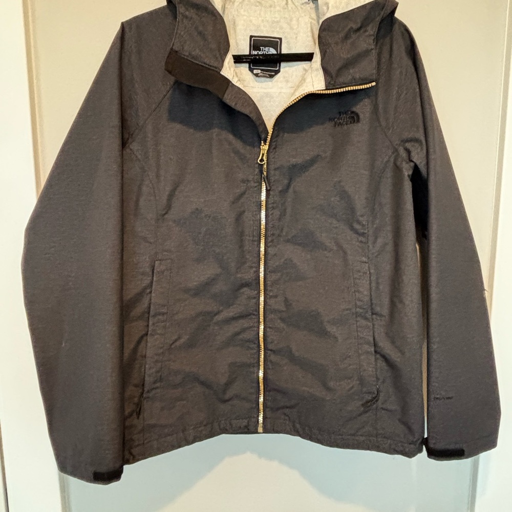 The North Face Charcoal Gray Rain Parka with gold zipper. - Picture 1 of 8